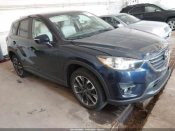  Salvage Mazda Cx