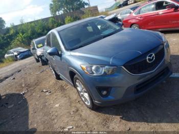  Salvage Mazda Cx